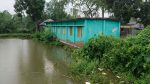 পুকুরে ধসে পড়ার ঝুঁকিতে স্কুল ভবন
